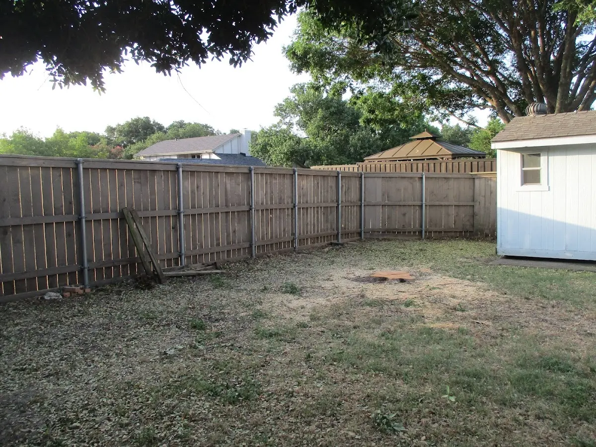 Cleared yard after professional tree removal in Floyd